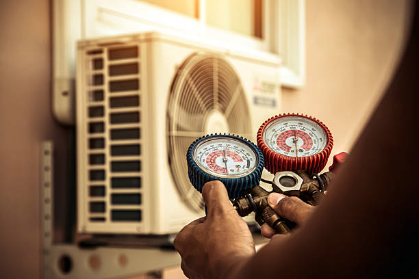 Professional Ac Installation technician working in Galveston, IN